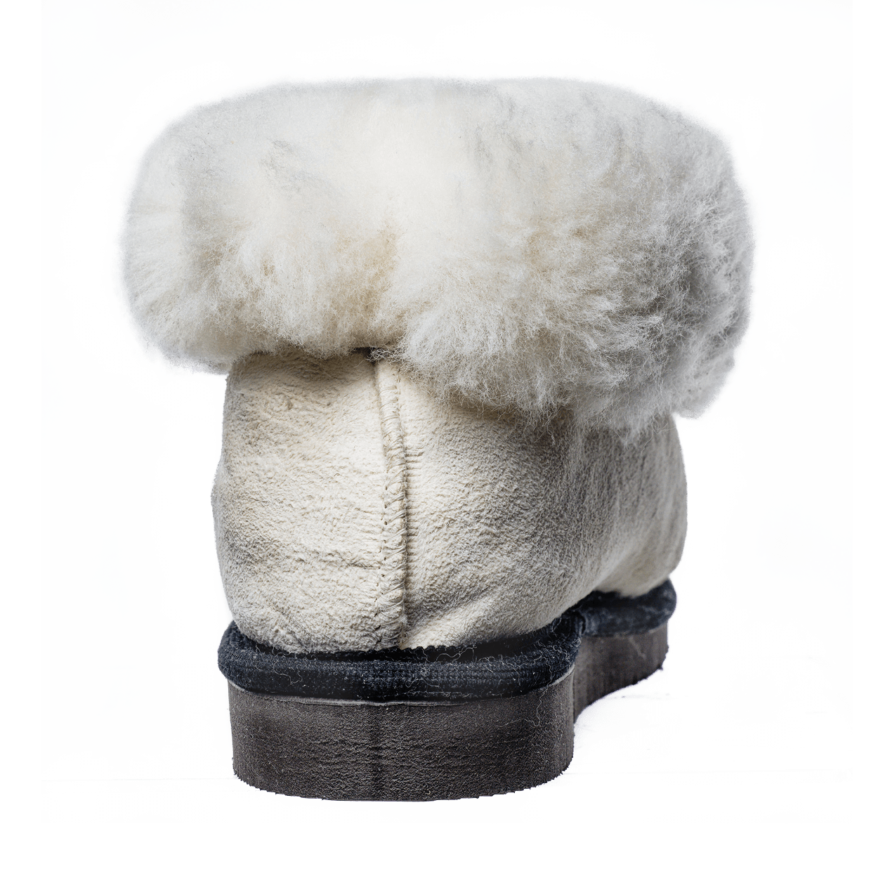 Rückansicht gemütliche Fellhausschuhe mit Gummisohle.